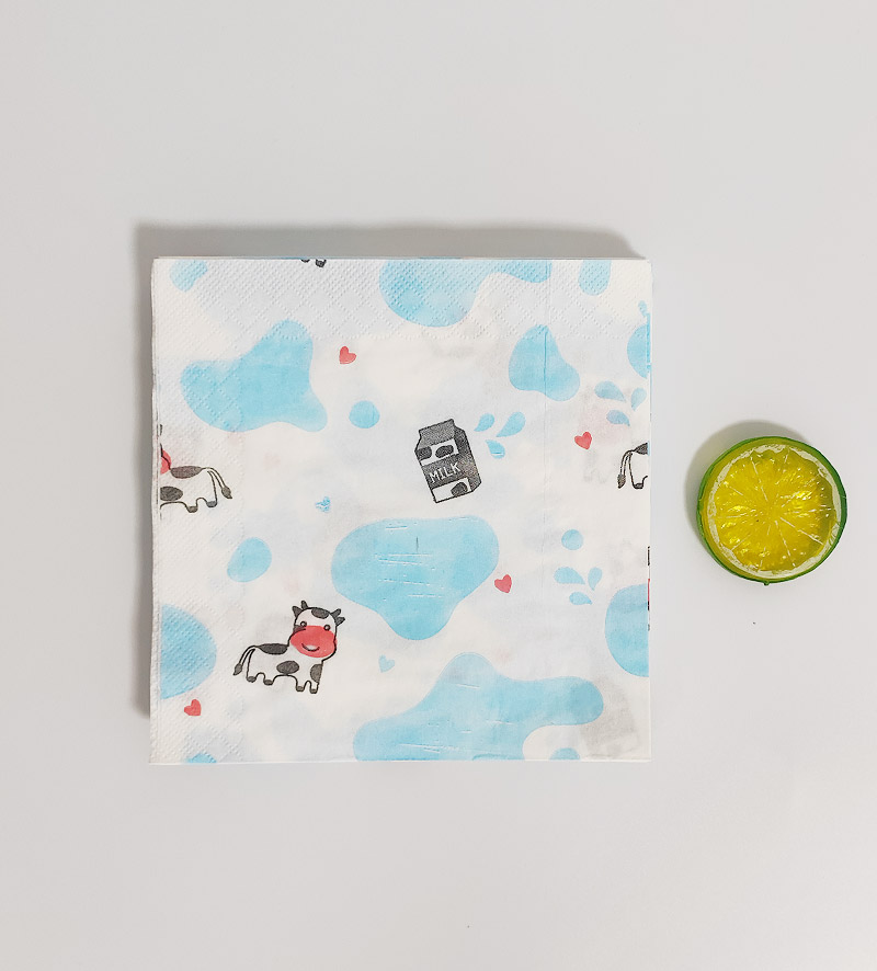 Disposable Cow Print Paper Napkins Nearby